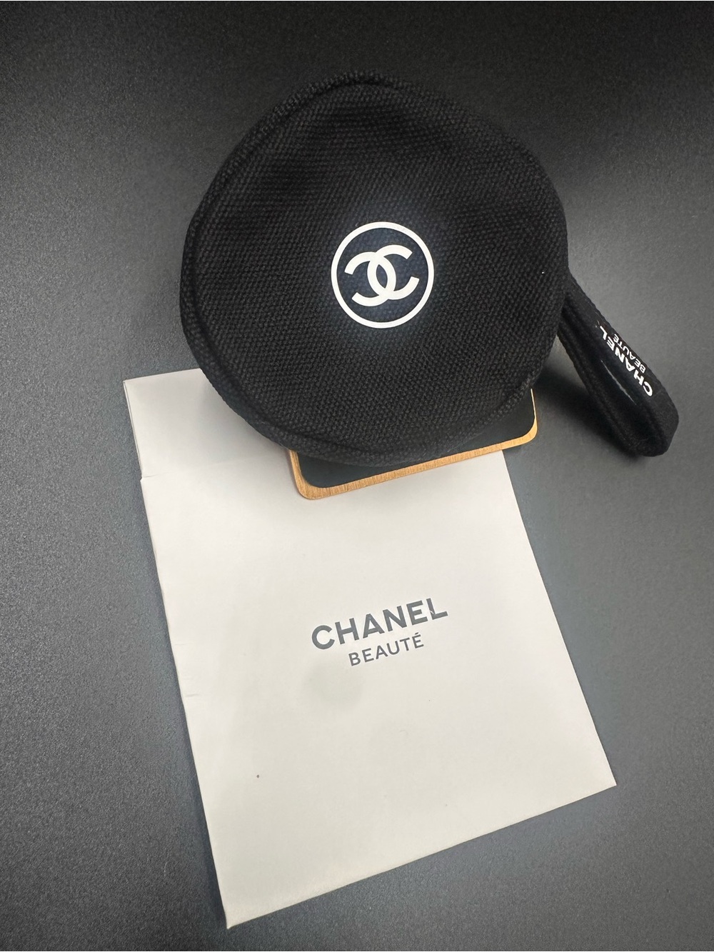 Black Round Cosmetic Pouch with CC Logo